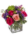 Composizione con rose fucsia e rosa